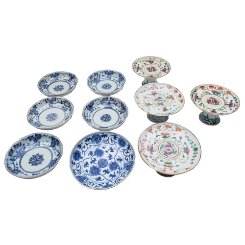 69 - A mixed group of Chinese and Japanese porcelain comprising a blue and white saucer dish painted with... 