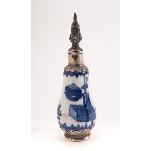 75 - A Chinese porcelain small bottle or snuff, of pear shaped form painted in blue with household object... 