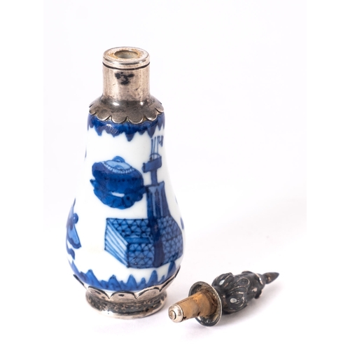 75 - A Chinese porcelain small bottle or snuff, of pear shaped form painted in blue with household object... 