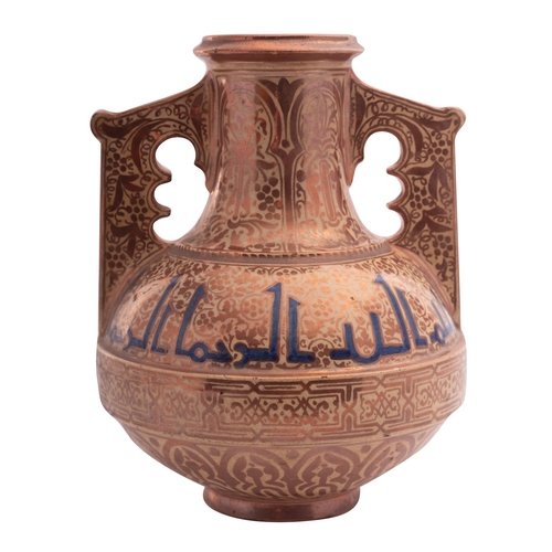 83 - A Hispano Moresque vase of squat form with raised central band and two raised handles profusely deco... 