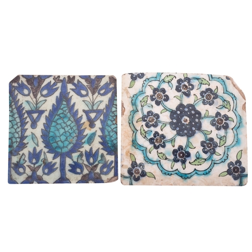 84 - Two Isnik pottery tiles, Damascus 17th century the first decorated in cobalt blue and turquoise with... 