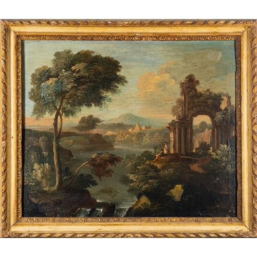 872 - Continental School, 18th Century A capriccio river landscape with elegant figures by classical ruins... 