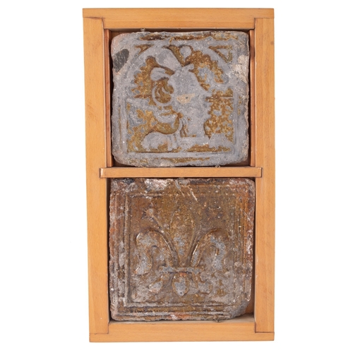 88 - A Barnstaple pottery tile, modelled in high relief with a fleur de lys within a double line border u... 