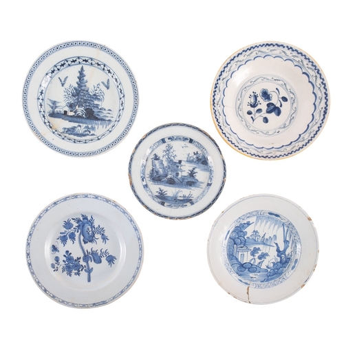 89 - A group of sixteen English and Dutch blue and white delftware plates 18th century one initialled to ... 