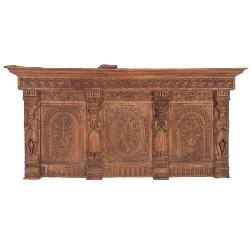 916 - A carved oak overmantel in 17th century style, 19th century; with moulded cornice above a frieze of ... 