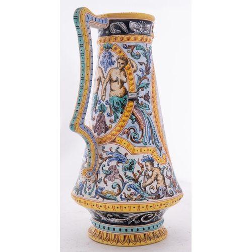 92 - A French polychrome faience jug, painted with an oval panel depicting a soldier in armour and verso ... 