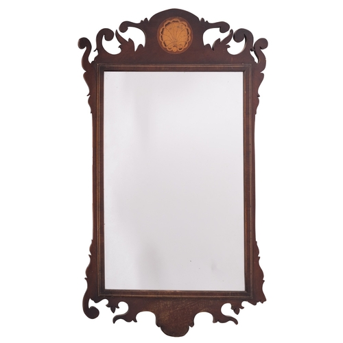 940 - A walnut and marquetry framed wall mirror in George I style, modern; the fret cut surround with scro... 