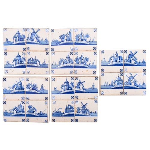 96 - A set of twenty Dutch Delft blue and white tiles in panels of four, painted with windmills and other... 