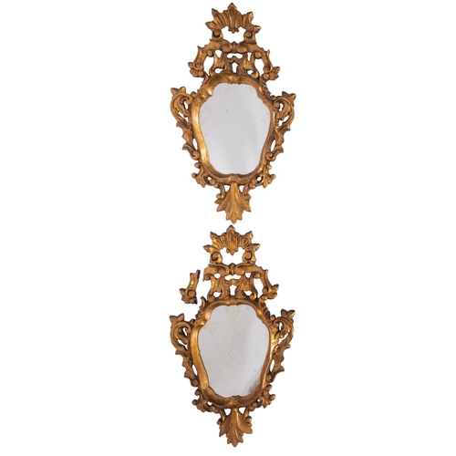 969 - A pair of carved and giltwood framed wall mirrors in Continental 18th century style, 20th century; o... 