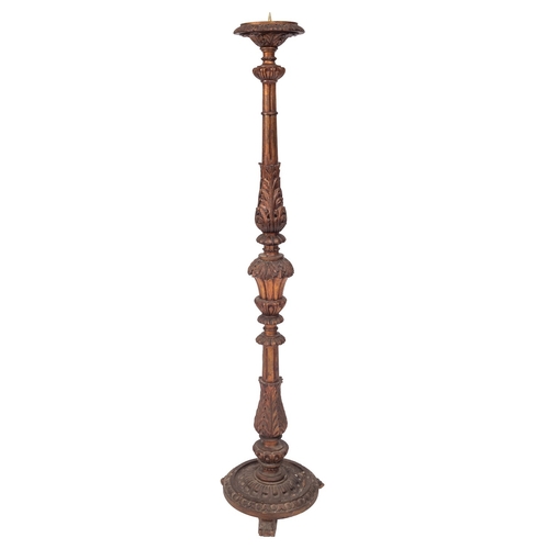 970 - A Continental carved and giltwood torchere stand, circa 1900; the pricket and circular platform on a... 