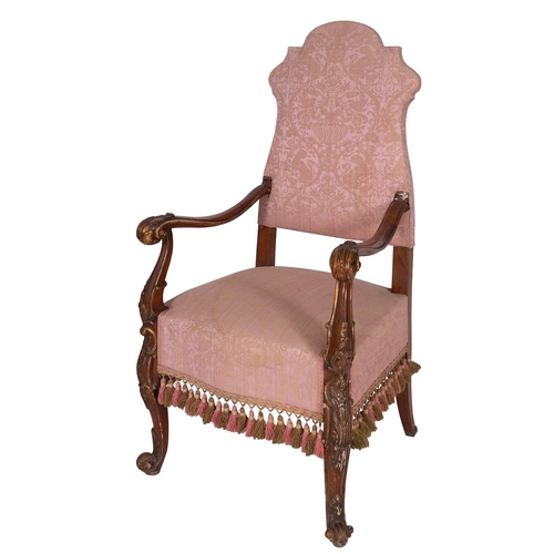 971 - A mahogany and upholstered elbow chair in early 18th century Continental taste, late 19th century ; ... 