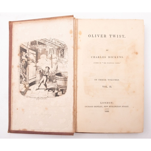 113 - DICKENS, Charles. Oliver Twist , London: Richard Bentley 1838, first book edition, 3 vols, illustrat... 