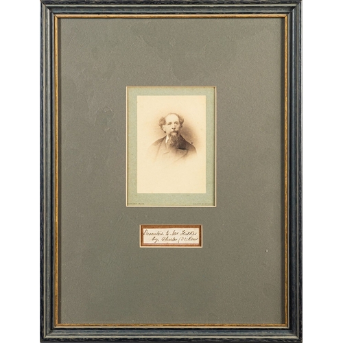 386 - DICKENS, Charles (1812-1870), an autograph clipping laid on board 'Presented to Mrs Hulker by Charle... 