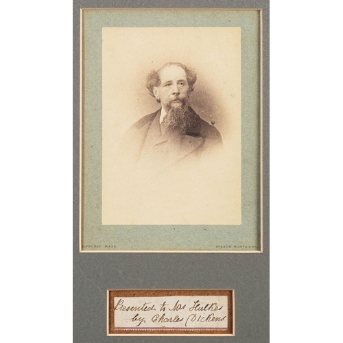 386 - DICKENS, Charles (1812-1870), an autograph clipping laid on board 'Presented to Mrs Hulker by Charle... 