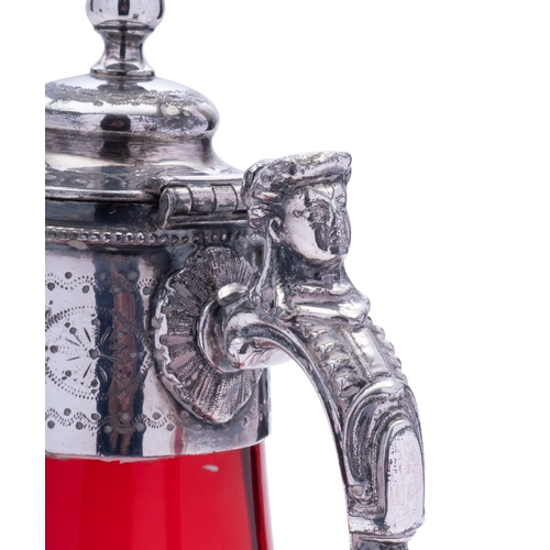 11 - An early 20th century electroplated claret jug, with a ruby glass body, 27cm (10.6in) high