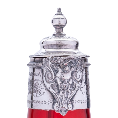 11 - An early 20th century electroplated claret jug, with a ruby glass body, 27cm (10.6in) high