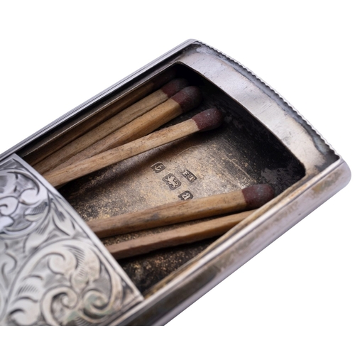 129 - A Victorian silver vesta case by E T, Birmingham 1900, of concave rectangular form, with sliding lid... 