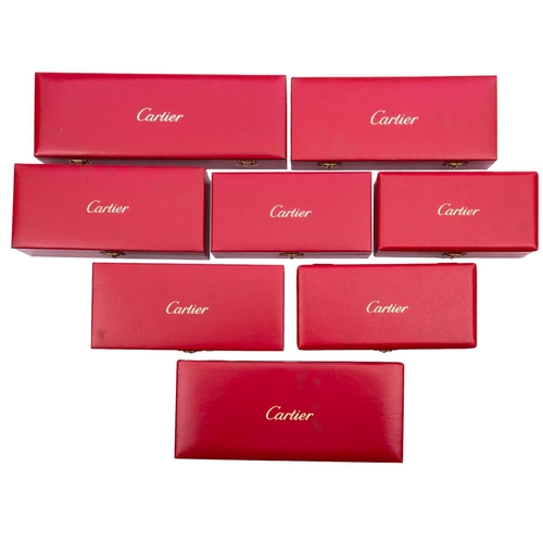 14 - Cartier, Must de Cartier, a\ set of six Trinity pattern silver plated canteen of cutlery comprising ... 