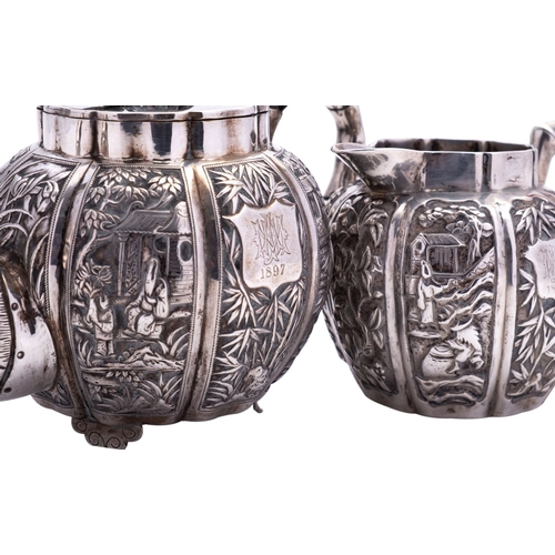 244 - A small mid 19th century Chinese export silver tea pot, probably by Wo Shing or Woshing 1830-1875 Ca... 