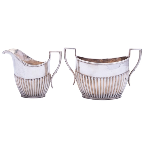 303 - A George V three piece tea service by Richard Richardson, Sheffield 1919, half reeded oval form comp... 