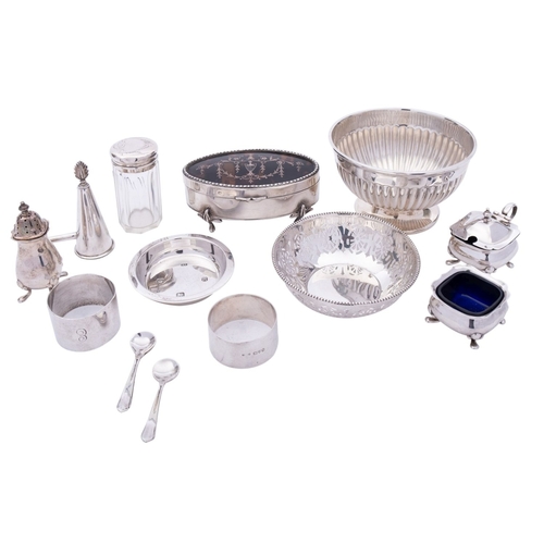 31 - A small group of silver comprising; a part reeded sugar bowl, raised on a flared foot, Mappin & Webb... 