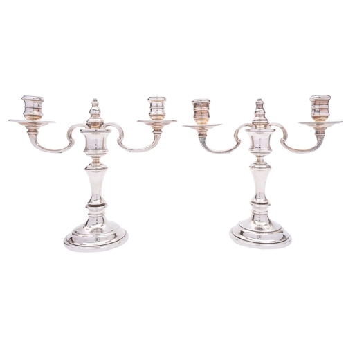 316 - A pair of Edward VII silver candlesticks by Elkington & Co Ltd, Birmingham 1902,  no scones, knopped... 