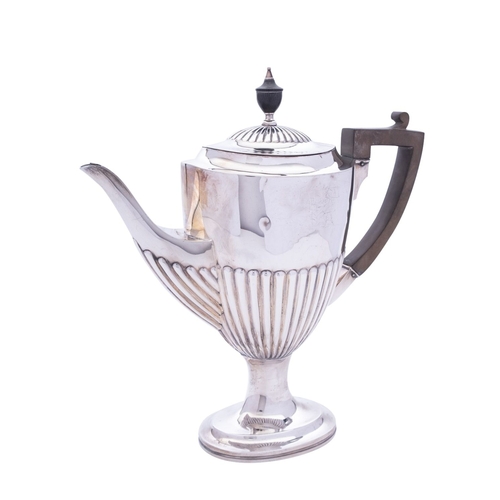 320 - An Edward VII silver tea pot by William Hutton & Son Ltd, London 1902, of vase shape, part reeded de... 