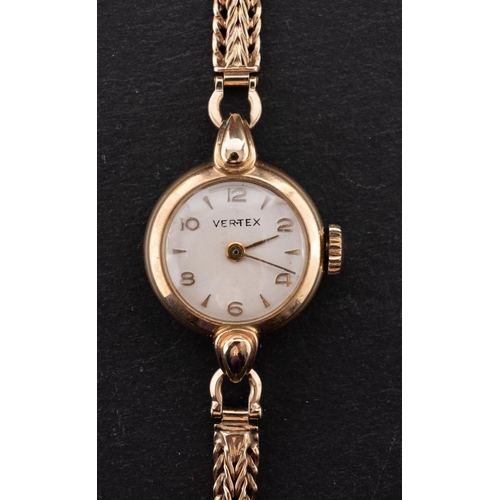 400 - Vertex a 9ct gold ladies watch, the round silvered dial with black Arabic numerals, the hinged case ... 