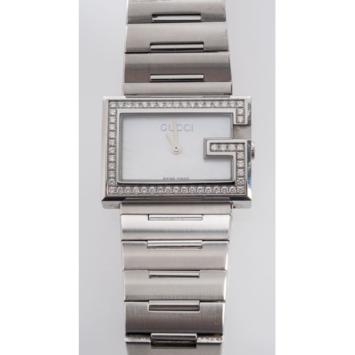 405 - Gucci, a stainless steel and diamond wristwatch, with quartz movement, with rectangular mother-of-pe... 