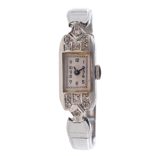 449 - An Art Deco cocktail watch, the geometric designed case set with twelve old-cut diamonds with side p... 