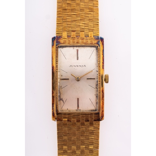 464 - Juvenia an 18ct gold gentleman's wristwatch the rectangular silvered dial with baton numerals and ha... 