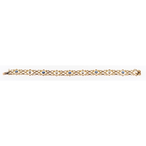 515 - A scroll & openwork link bracelet, set with five oval-cut sapphires and five pearls, push-in clasp, ... 