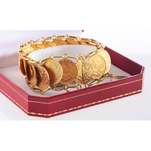 517 - A 22ct yellow gold bracelet, composed of nineteen '50' Piastra gold coins (Turkish), dated 1911, ove... 