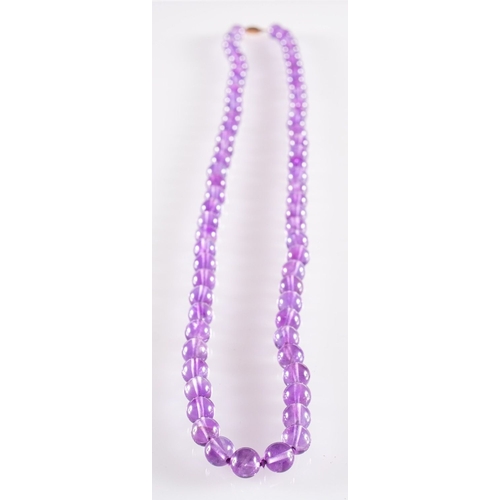 524 - An Amethyst bead necklace, circular 8mm amethyst beads to a 9ct yellow gold clasp, clasp marked 9ct,... 