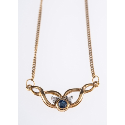 543 - A pendant necklace, the pendant centrally set with a circular-cut sapphire and a brilliant-cut diamo... 