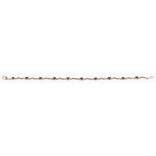 546 - A 9ct yellow gold sapphire & diamond bracelet, a curved link bracelet interspaced with ten oval-cut ... 