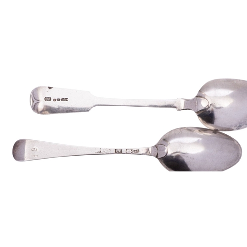 82 - Nine Georgian silver Hanoverian pattern table spoons, various makers and dates, 559g (18 oz)