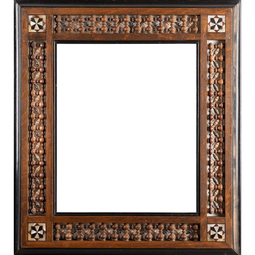 1 - An Arts and Crafts Moorish frame with Mashrabiya turnings and bone inlay. 47 x 41cm, 27 x 20.5cm (re... 