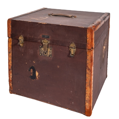 177A - A canvas covered and leather bound square travelling box with brass lock and hinges, 51cm x 46cm x 4... 