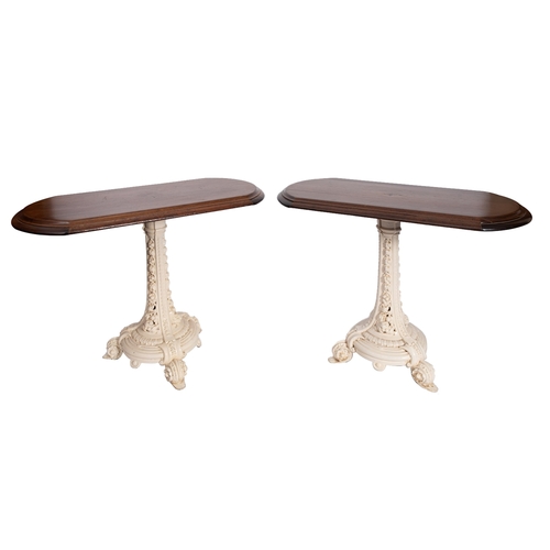 187 - A pair of Victorian cast iron and later stained oak topped conservatory tables, late 19th Century, w... 