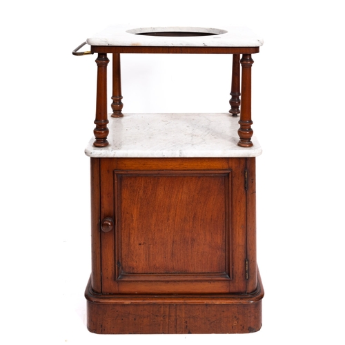 197 - A Victorian mahogany square wash stand with white variegated marble top, having a circular aperture ... 