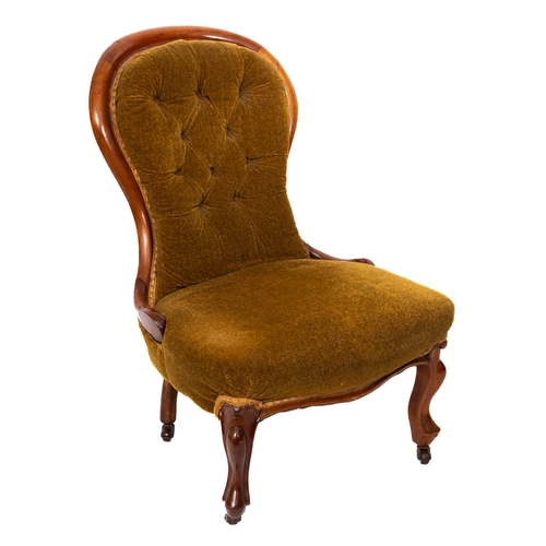 202 - A lady's Victorian walnut nursing chair, with cartouche shaped button down back and bowed stuffover ... 