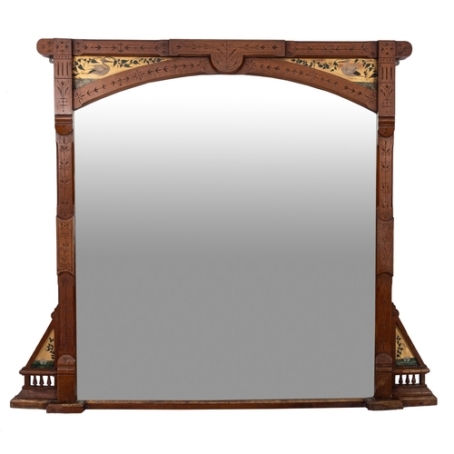 204 - A late Victorian oak and decorated overmantel mirror in the Aesthetic Movement taste with incised de... 