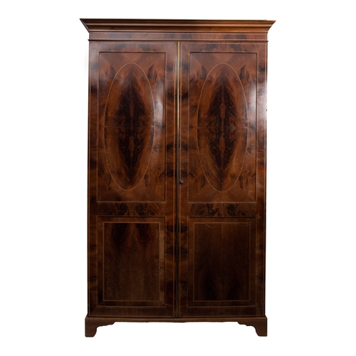 226 - An Edwardian mahogany and inlaid wardrobe, early 20th Century, decorated with boxwood, ebonised and ... 