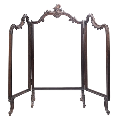 242 - A 19th century French ebonised three-fold screen with floral carved show frame raised on scroll carv... 