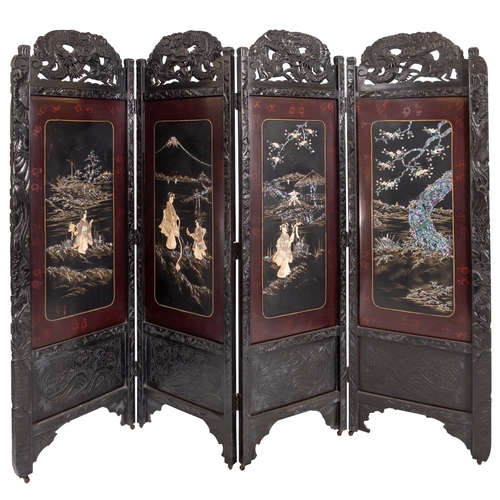 263 - A Japanese carved ebonised wood and shibayama four-fold room screen, circa 1900, the brown and black... 