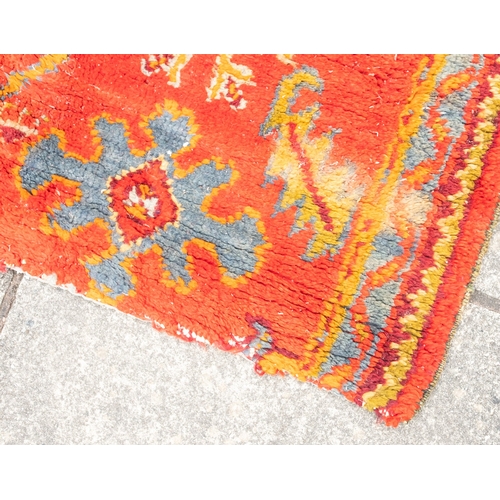 265 - A Turkey runner of traditional design and colours with five geometric medallions, 342cm x 90cm, toge... 