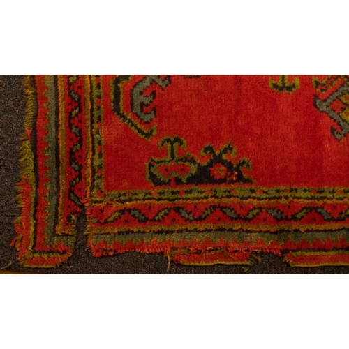 266 - A Turkey rug of traditional design and colours, 244cm x 156cm, also a Turkey runner, 350cm x 93cm, a... 