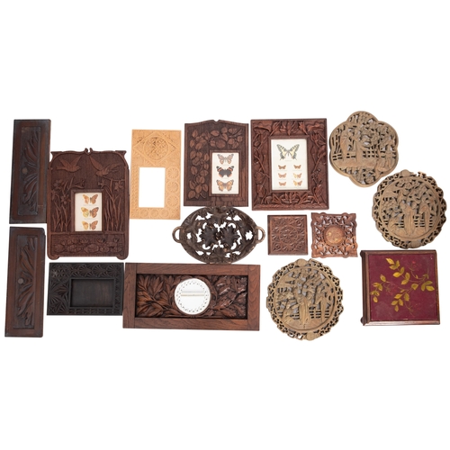 301 - A collection of assorted relief carved wood items, 19th and early 20th century; including five photo... 