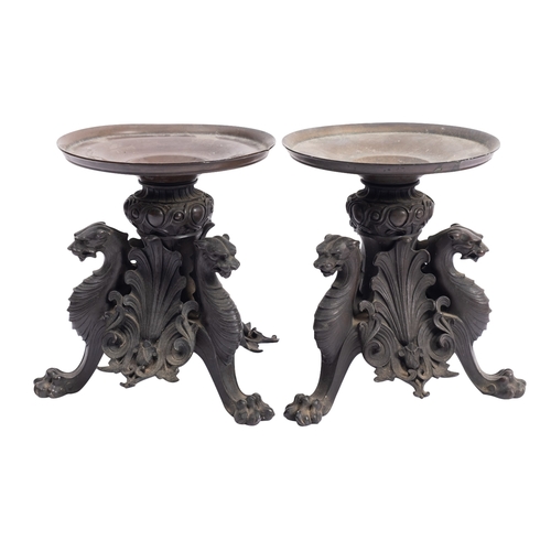 305 - A pair of bronze tazzas, circa 1875, the adapted circular tops on tripod supports in the forms of my... 